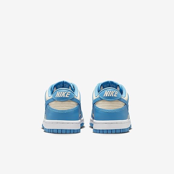 Kids' Nike Dunk Low sneakers, heel view, blue uppers with NIKE logo on back