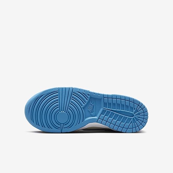 Kids' Nike Dunk Low outsole view, blue tread with circular traction design