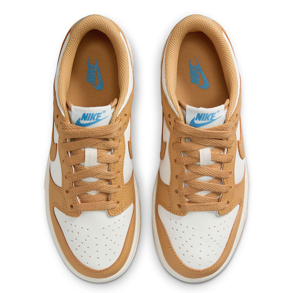 Kids' Nike Dunk Low lace-up sneakers with tan suede uppers and blue Nike branding