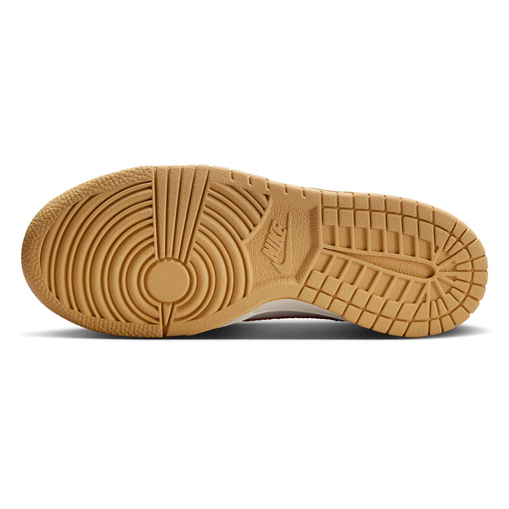 Nike Dunk Low outsole and heel in tan rubber with circular traction pattern