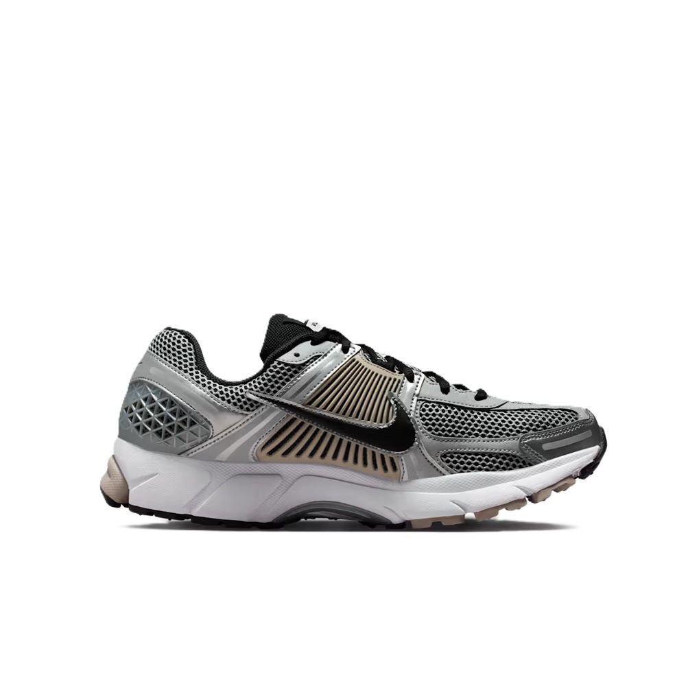 Men's Nike Zoom Vomero 5 side view with grey mesh upper, black accents, and foam sole