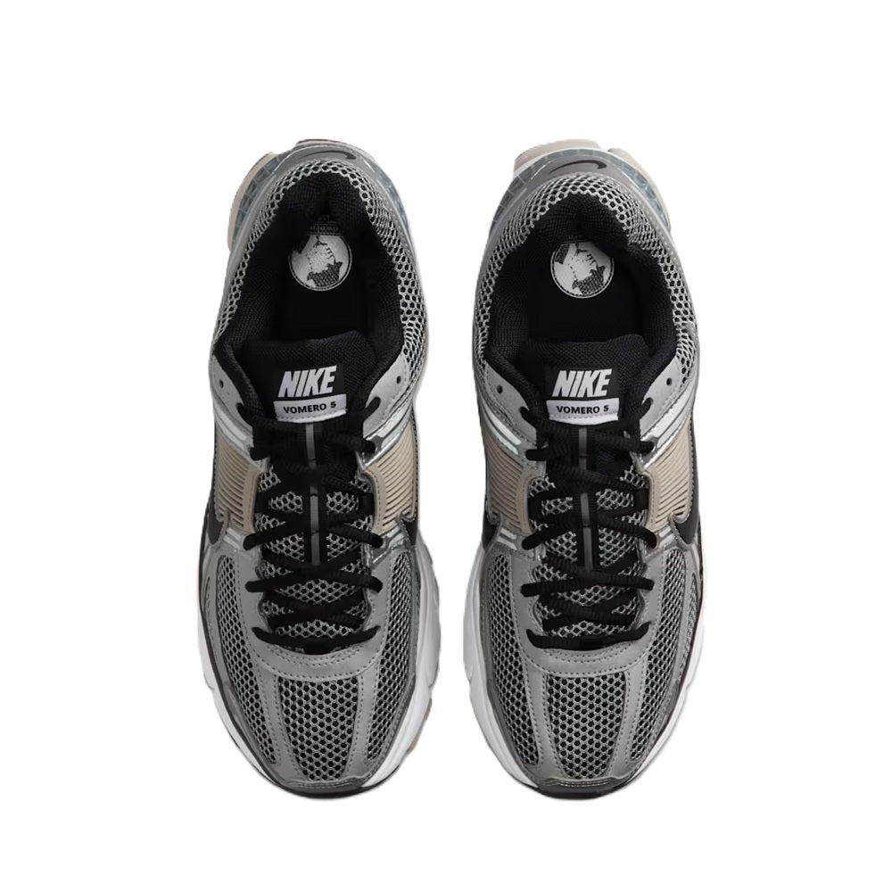 Men's Nike Zoom Vomero 5 tongue and lace view with NIKE logo on grey-and-black interior