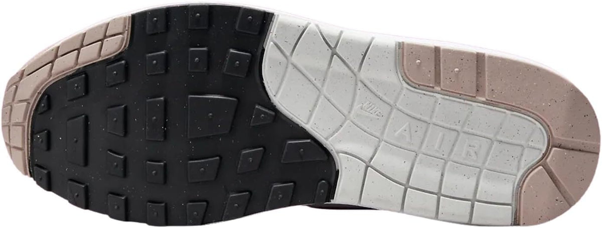 Nike Air Max 1 SC outsole view, black traction tread with light midsole edge