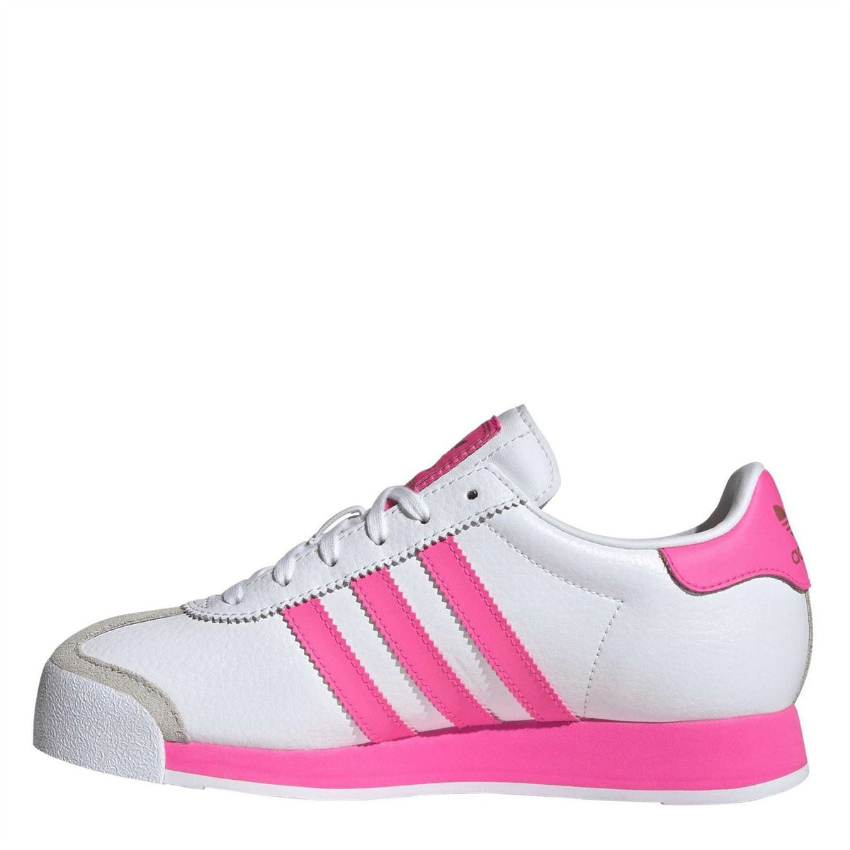 White juniors' low-top shoes with pink Adidas stripes and lace-up closure, grey toe trim.