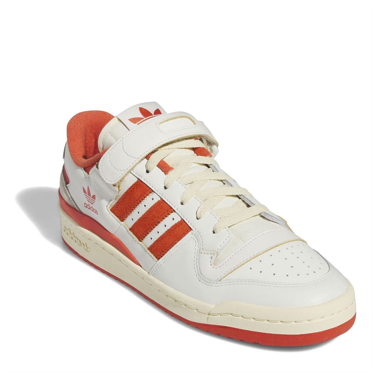 Low-top sneakers: ivory leather with red stripes, orange lining, lace and strap closure
