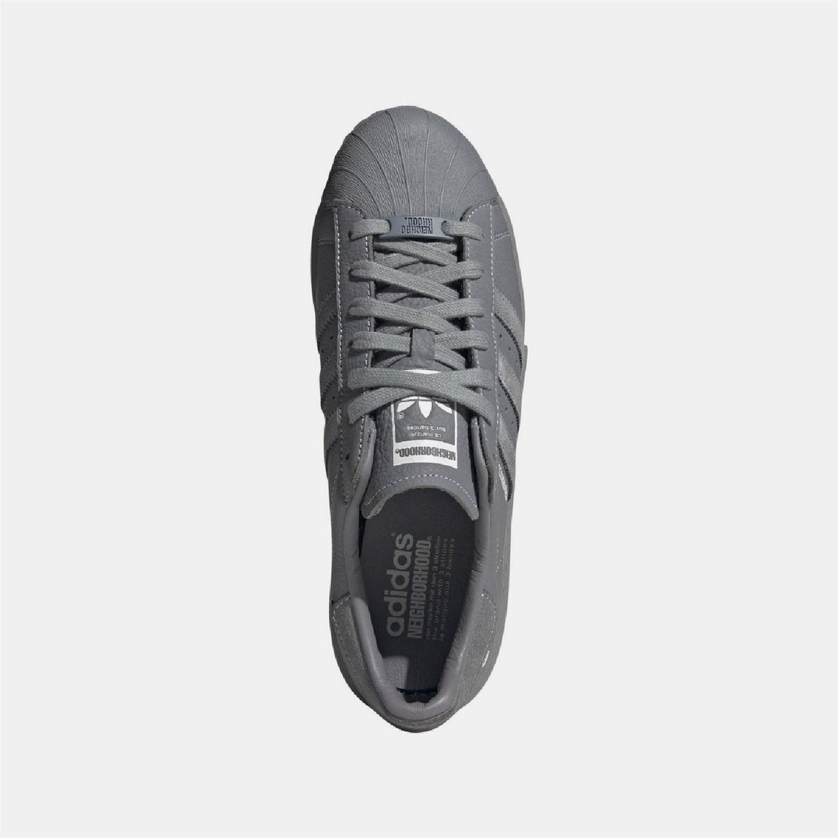 Grey adidas Originals N 2024 trainers viewed from above, lace-up and tongue label