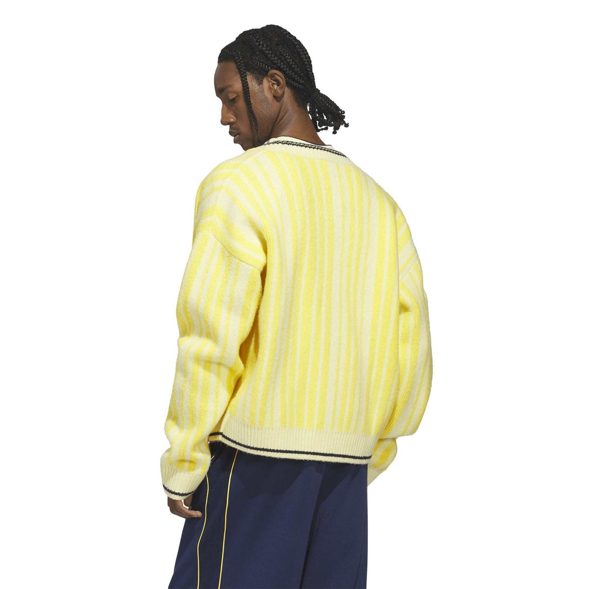 Yellow striped cardigan with navy ribbed hem and back yoke.