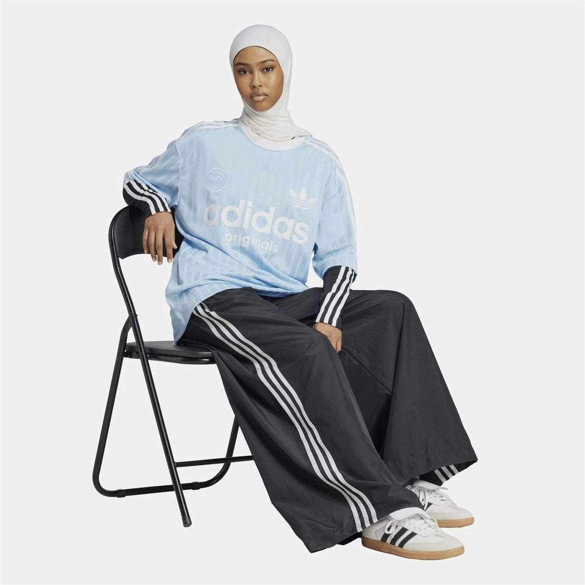 adidas Originals T-shirt in classic design, featuring the brand logo on a casual top perfect for everyday wear