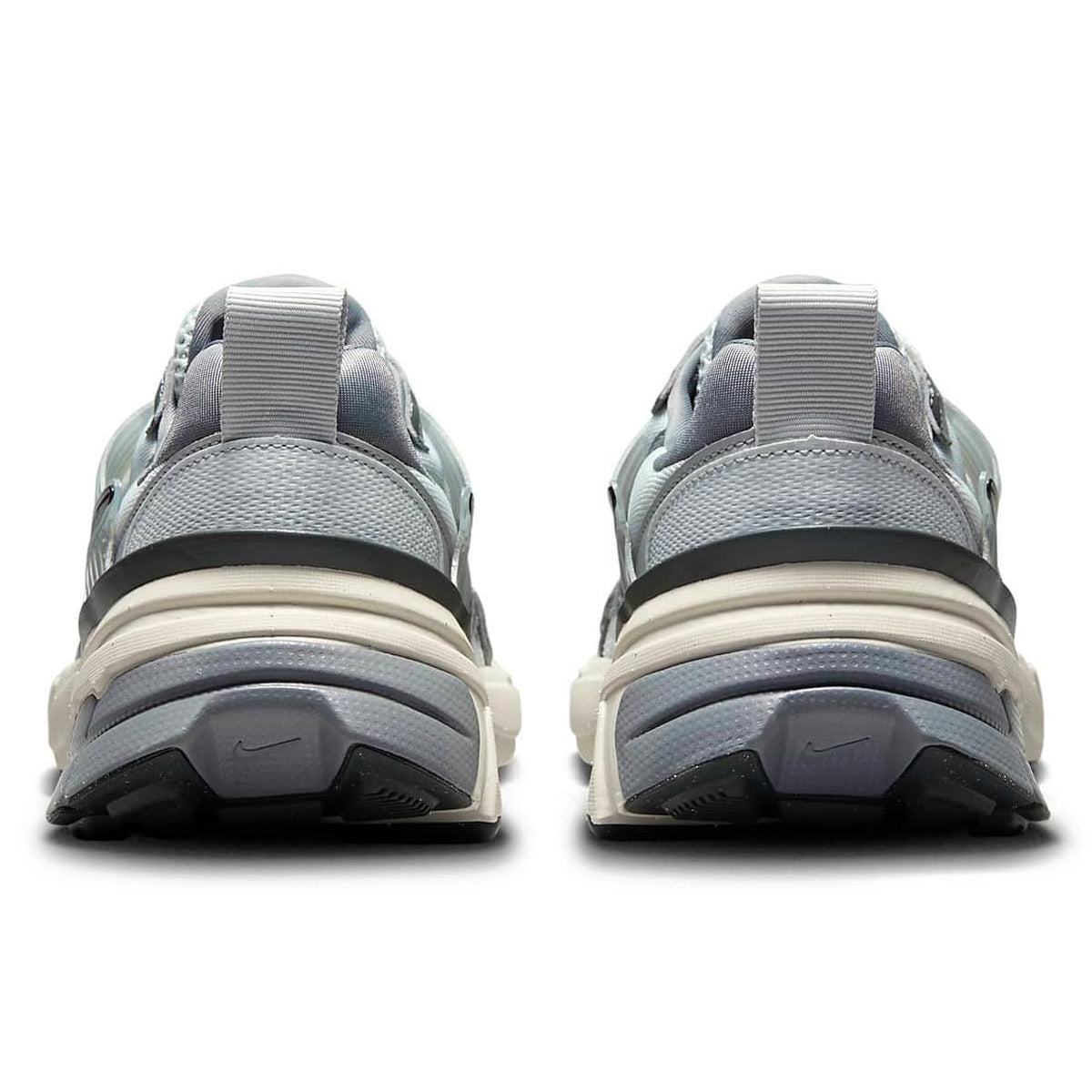 Women's Nike lace-up sneakers, rear heel view with cushioned collar and strap