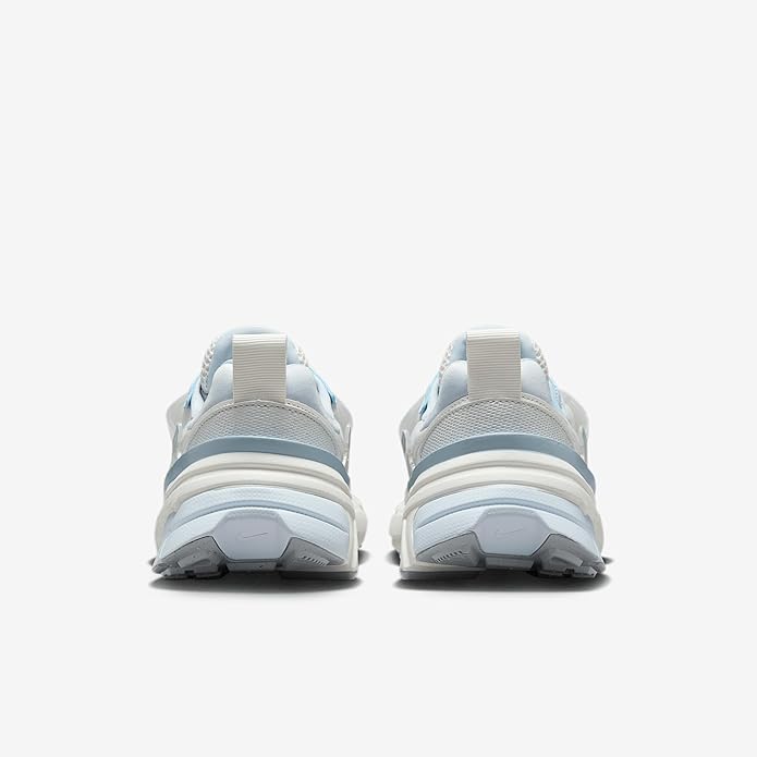 Nike V2K Run women's sneaker, rear view with white heel and light blue collar