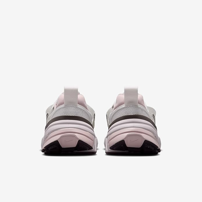 Women's sneakers heel view in metallic silver with light lilac trim and molded back