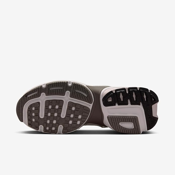 Women's sneaker outsole with gray traction pods and black rubber sections