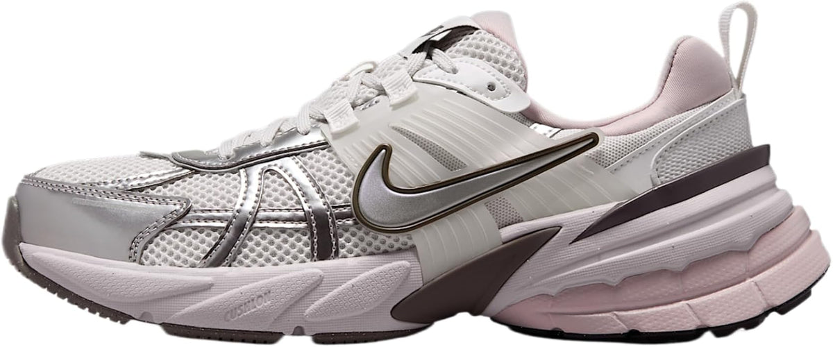 Women's running sneakers in metallic silver with lilac accents and lace-up design