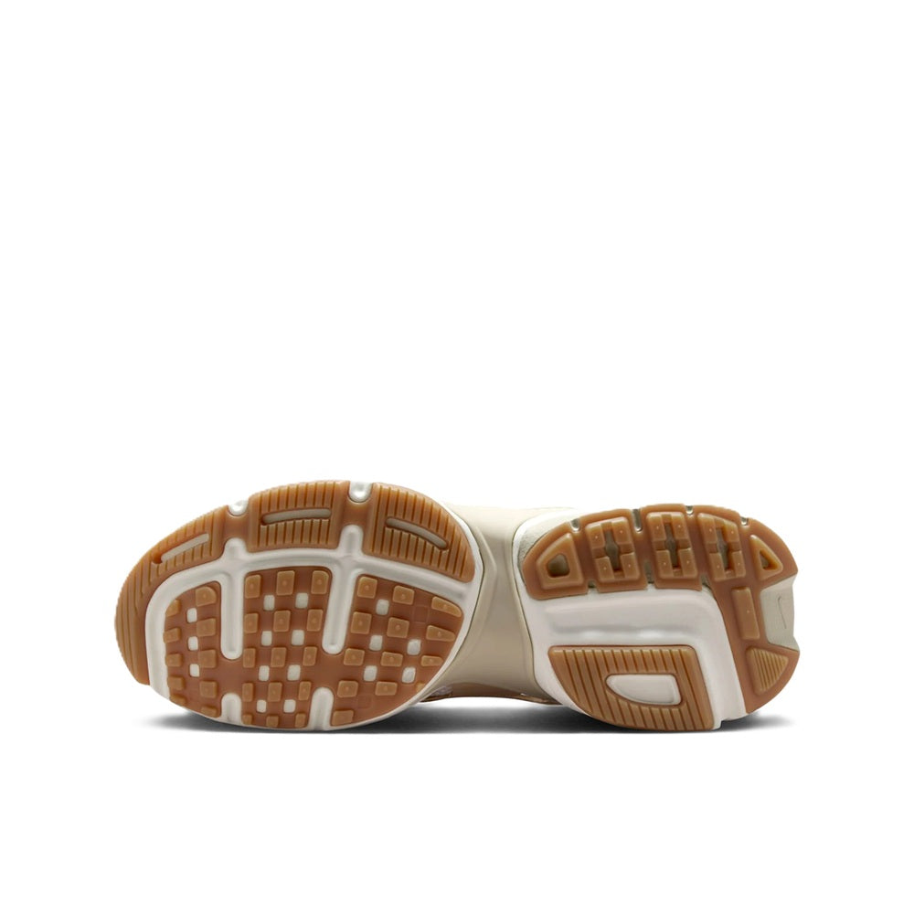 Nike V2K outsole view with tan tread pods and patterned rubber base