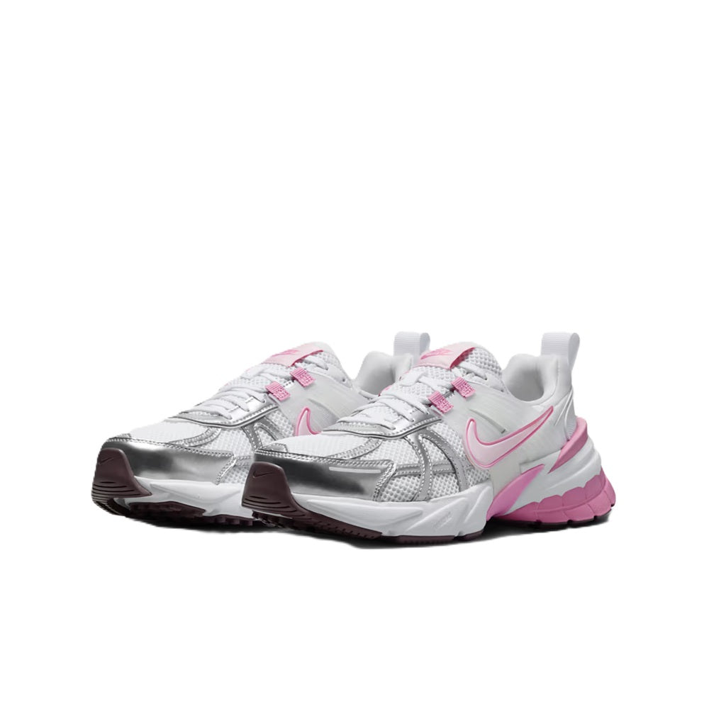 Women's Nike V2K Run sneakers, silver-gray and white uppers with pink swoosh detailing.
