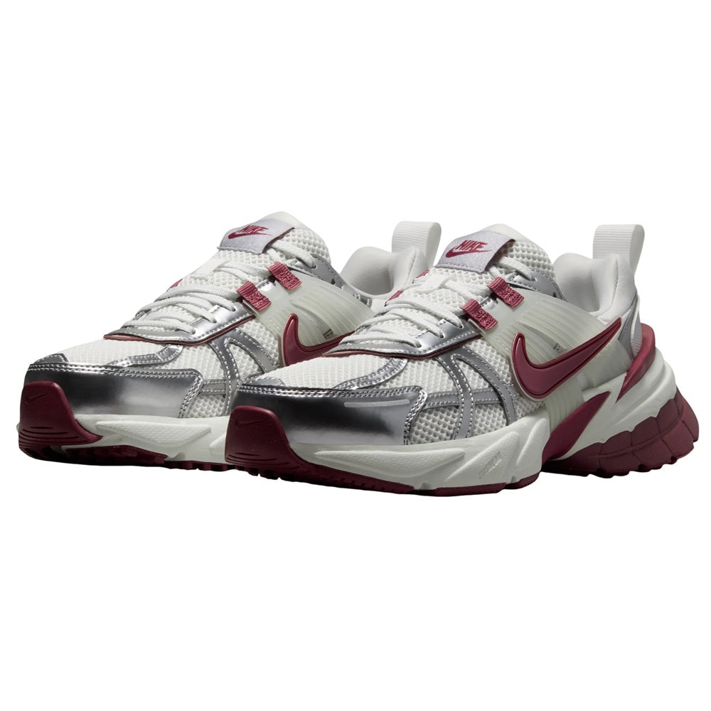Pair of women's Nike V2K Run lace-up sneakers in white with maroon details