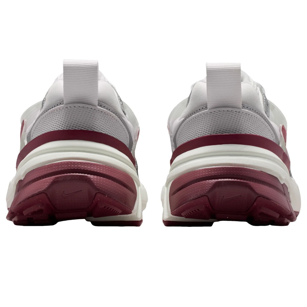 Women's Nike V2K Run heel close-up, white upper with maroon trim and midsole