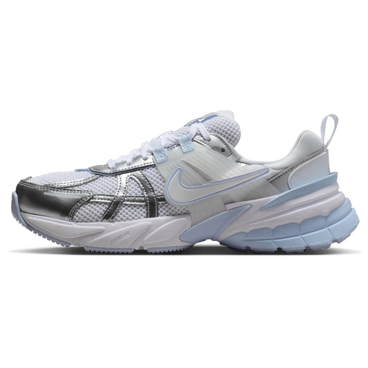 Nike V2K Run sneakers in white and metallic silver with blue accents and lace-up design