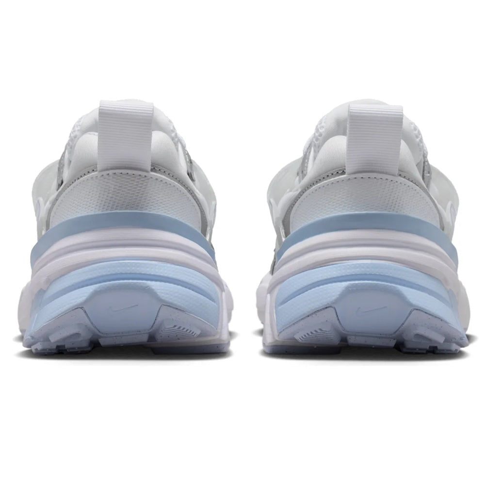 Nike V2K Run sneakers, back view, white heel with stacked midsole and blue stripe detail