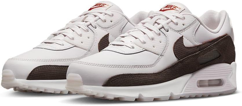 Pair of Nike Air Max 90 LTR sneakers, white with dark brown overlays and Air units