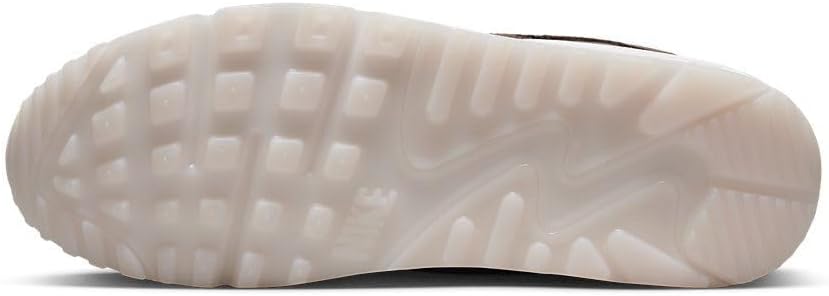 Nike Air Max 90 LTR outsole view with raised tread pattern on light rubber