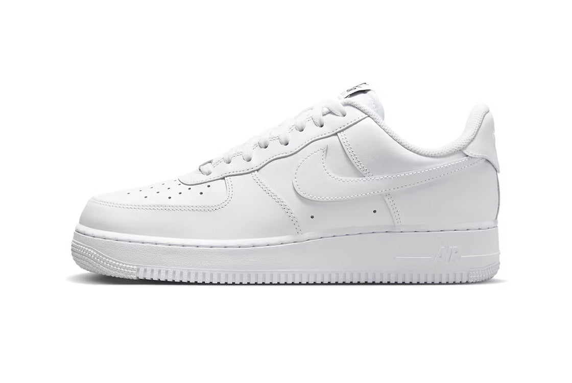 Nike Air Force 1 low-top sneakers, white leather, lace-up with Swoosh and perforations