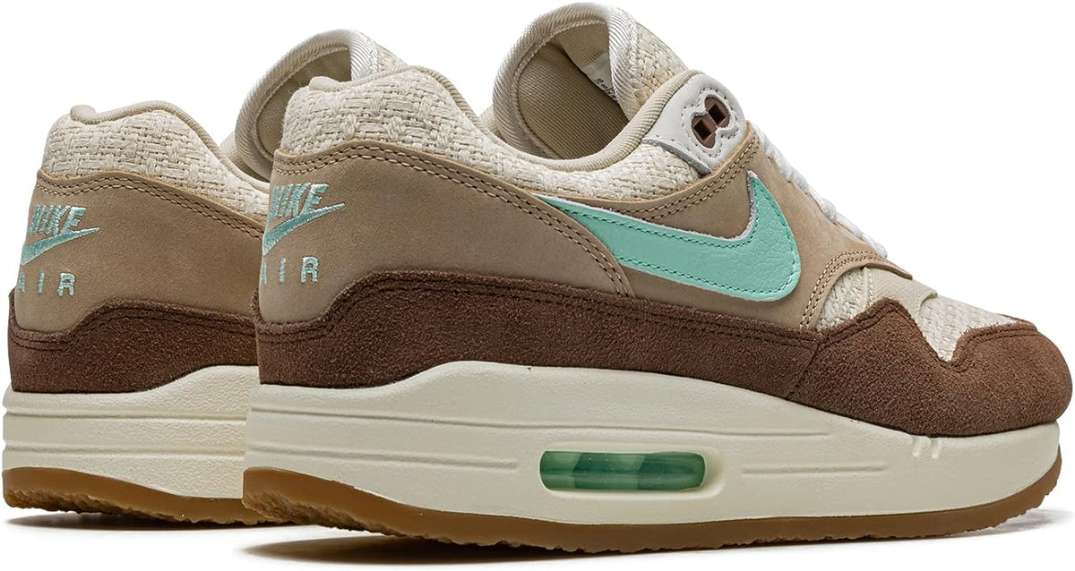 Nike Air Max 1 PRM sneaker, heel and side view with mint Swoosh and Air window