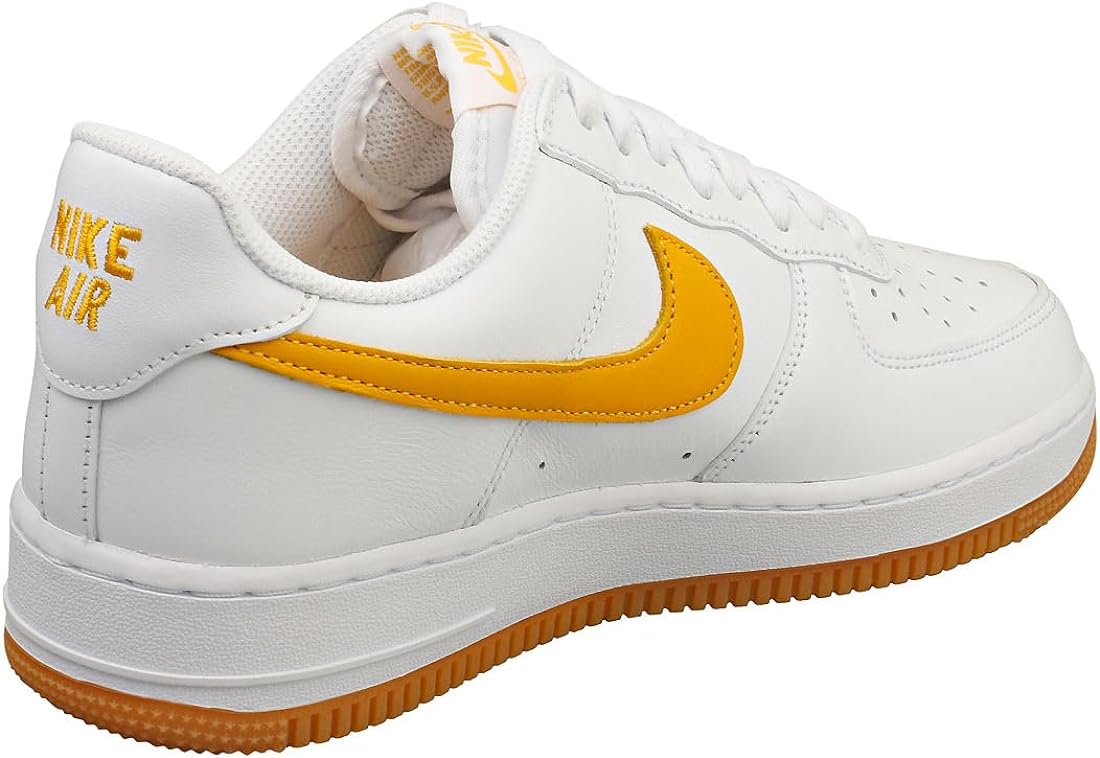 Men's Nike Air Force 1 Low heel view, white leather with yellow swoosh and gum sole