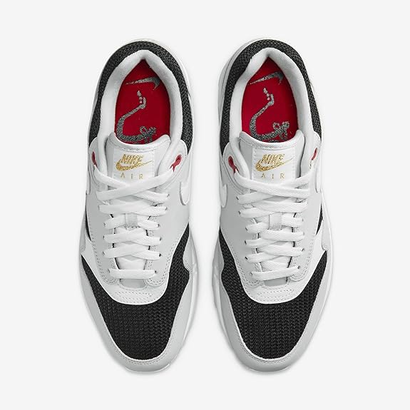 Nike Air Max 1 PRM laced sneaker with red insole graphic and black heel panels