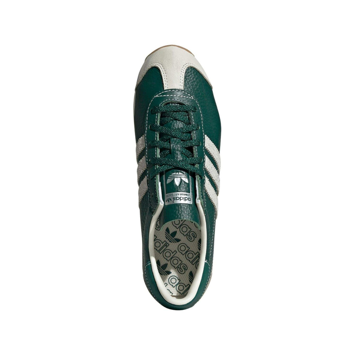 Green and white lace-up adidas Originals trainers with adidas logo on tongue