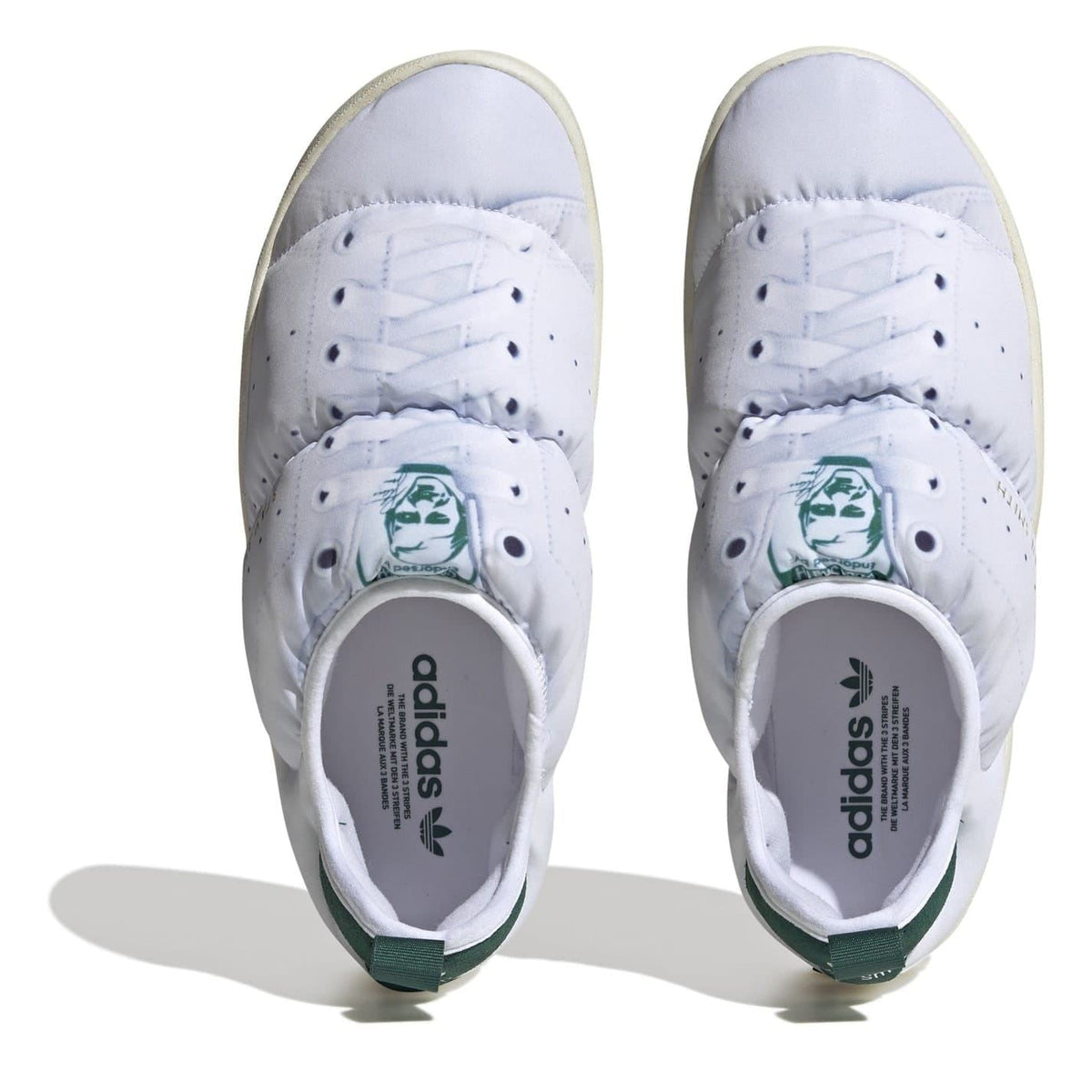 adidas Originals Puffy Spr Trainers with three stripes, showcasing the stylish footwear design and textured puffy upper.