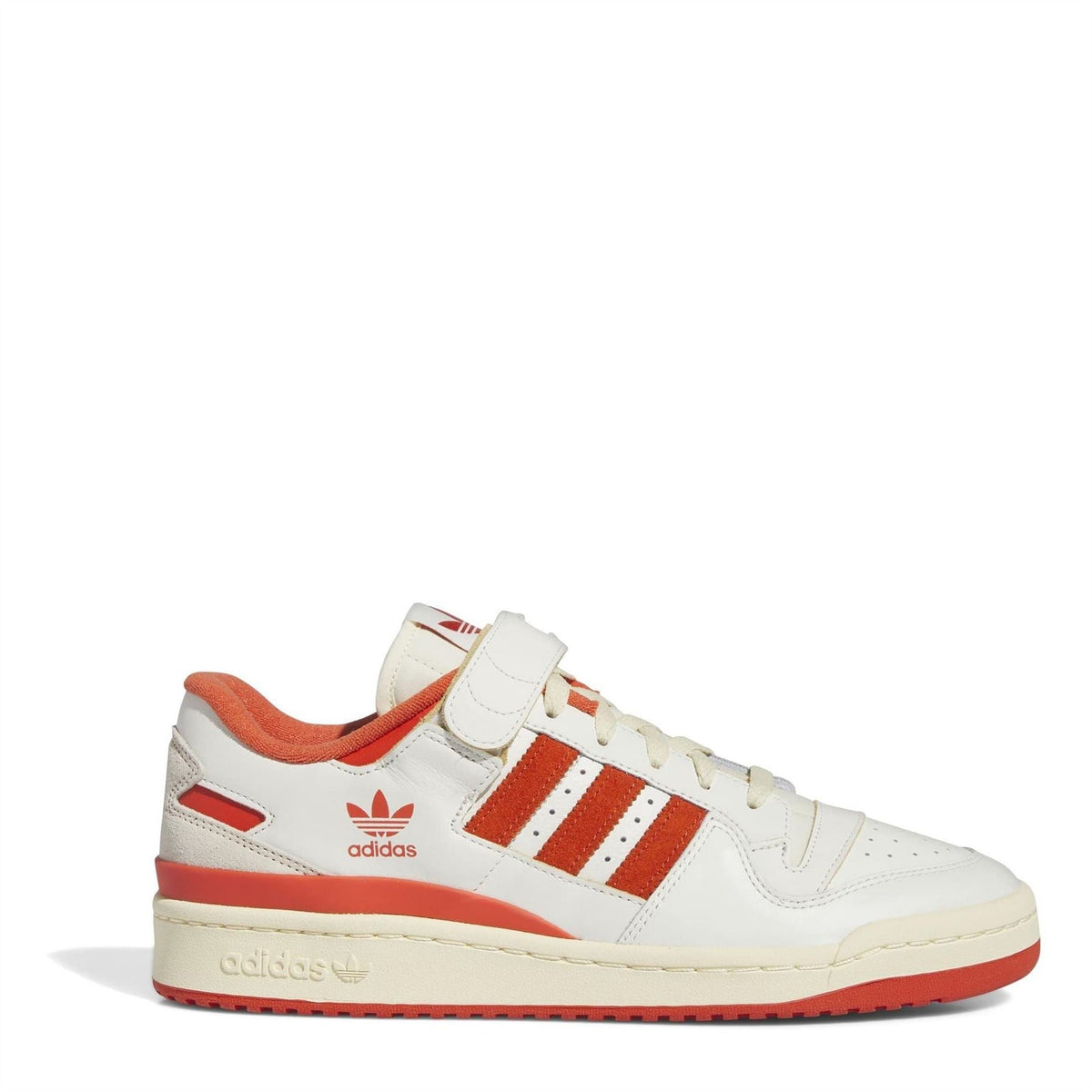 Low-top sneakers: ivory upper, red stripes, orange heel and strap detail
