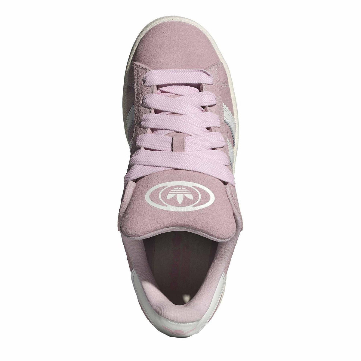 Pink suede trainers, front view with white laces and adidas tongue logo