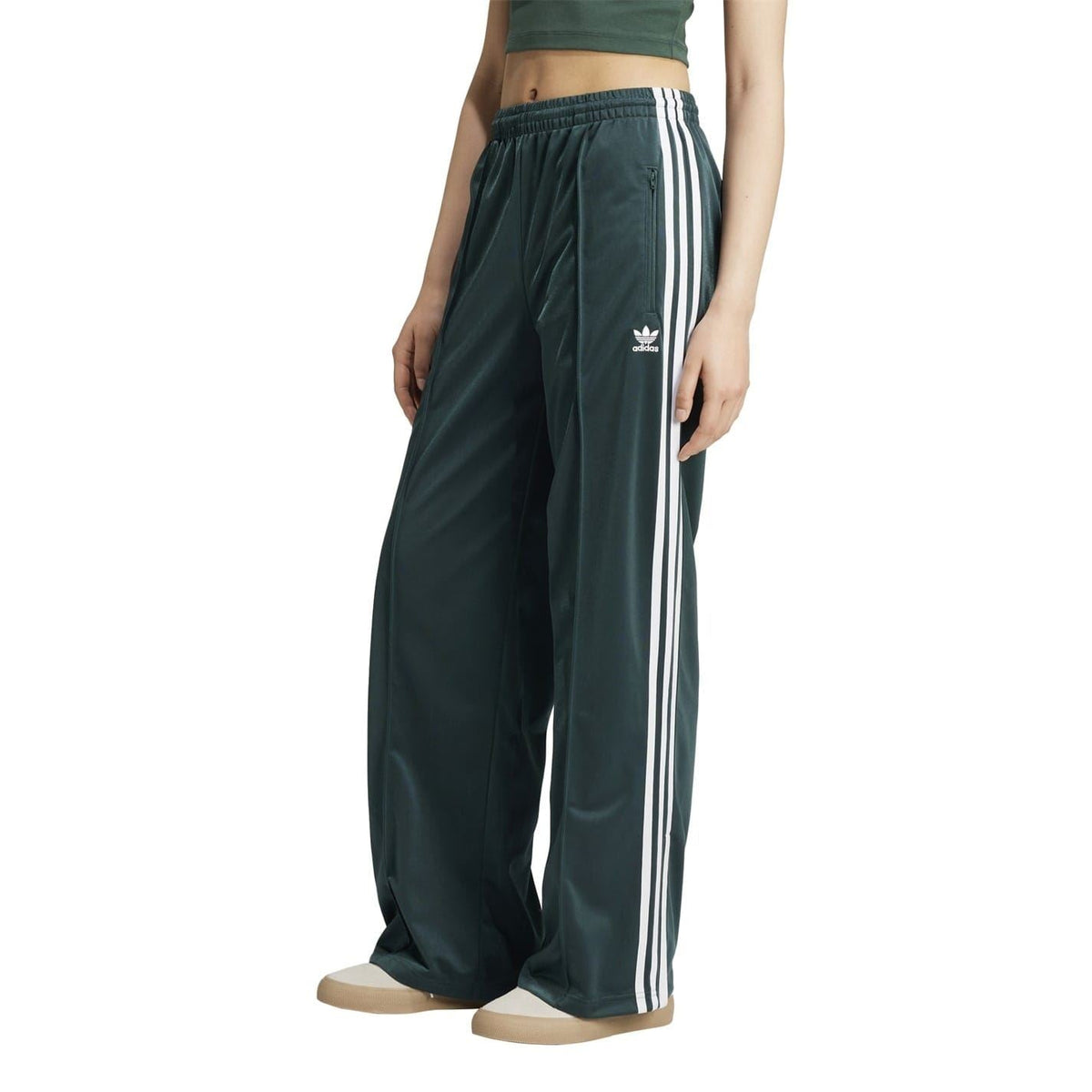 adidas Originals loose dark teal track pants with white side stripes and small adidas logo