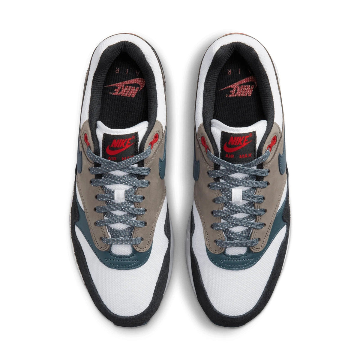 Front view of low-top sneakers with white laces, gray eyelets, teal side stripe, black toe