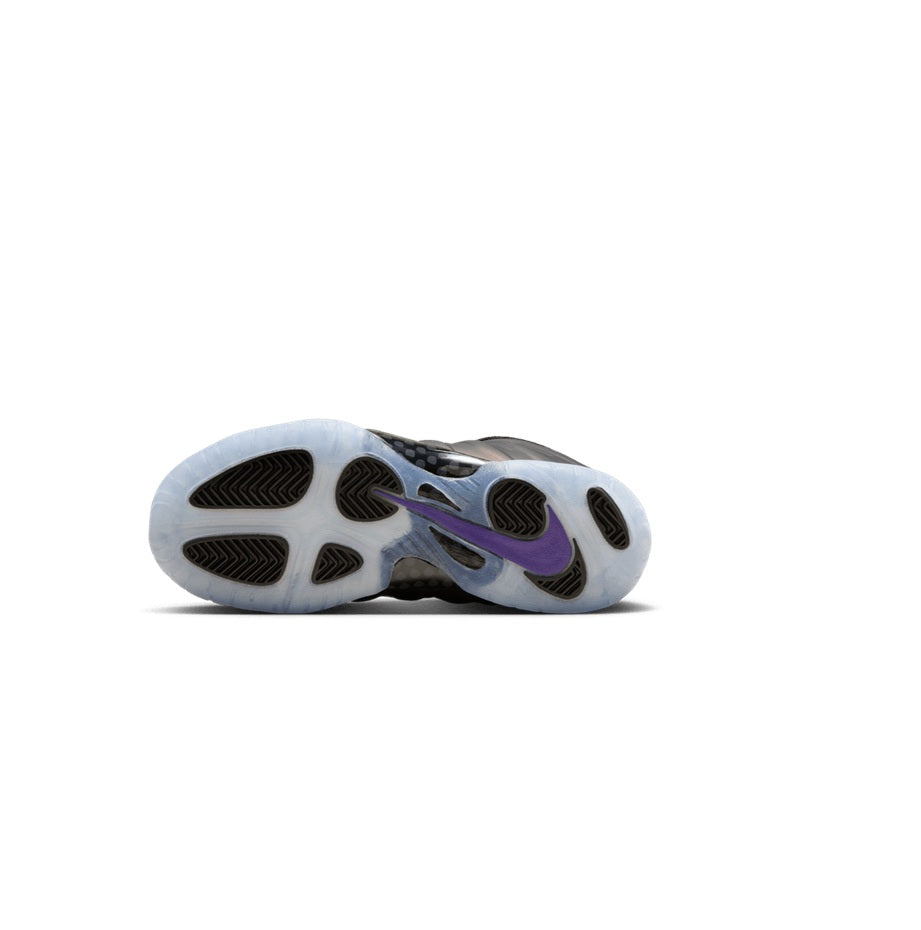 Nike kids sneakers outsole view, light-blue tread with purple accents