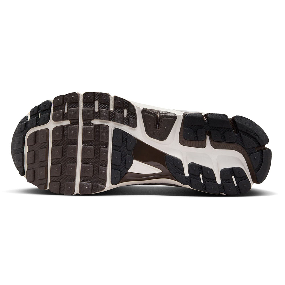Nike women’s sneakers outsole view with dark tread and white midsole