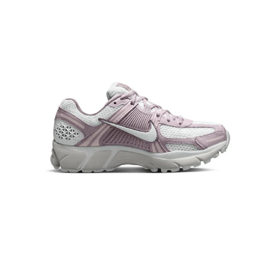 Nike Zoom Vomero 5 women’s running sneaker in off-white, pink, and gray with laces