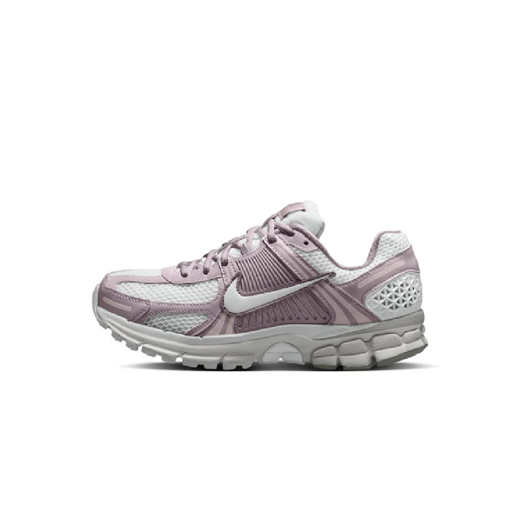 Nike Zoom Vomero 5 running shoe with mesh overlays, off-white and pink accents