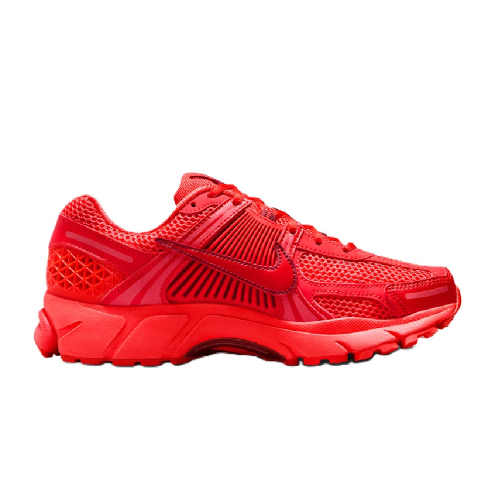 Red mesh Nike Zoom Vomero 5 LT women's running shoe with swoosh and thick sole