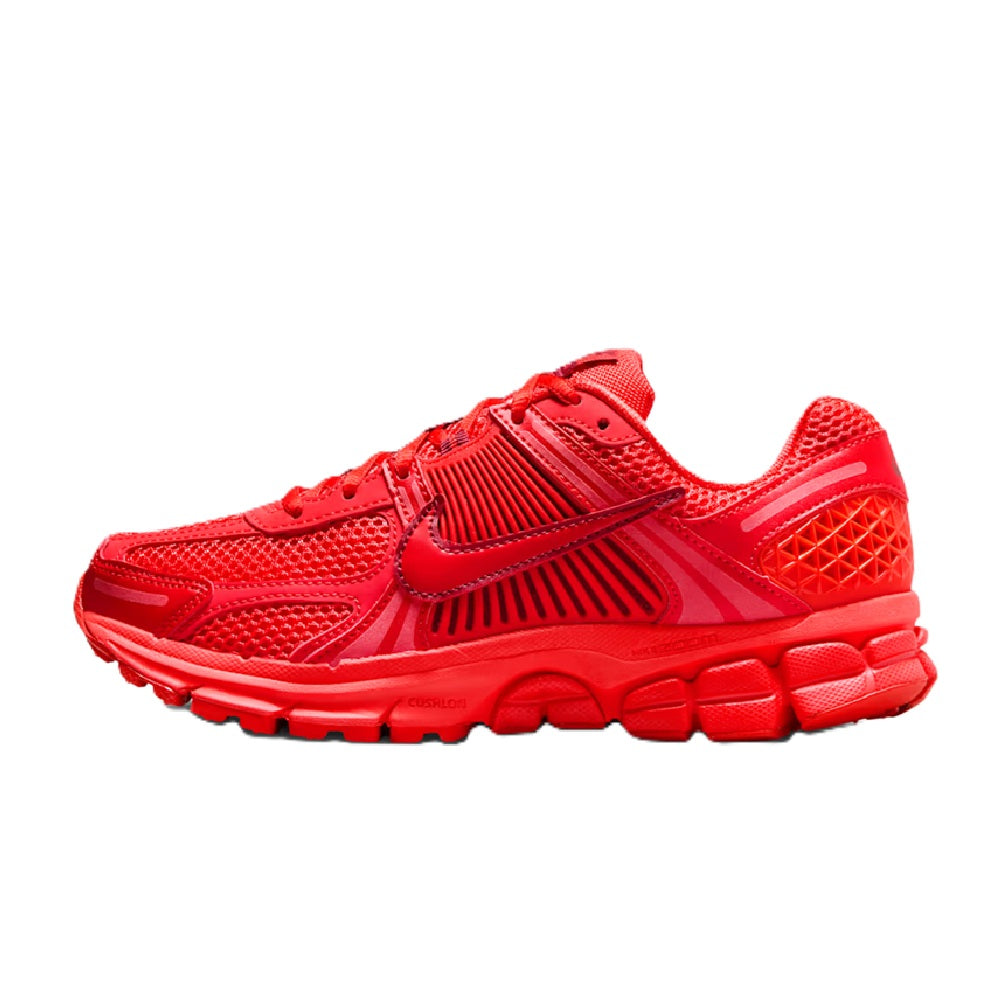 Red Nike Zoom Vomero 5 LT women's running shoe, side view, textured upper and swoosh