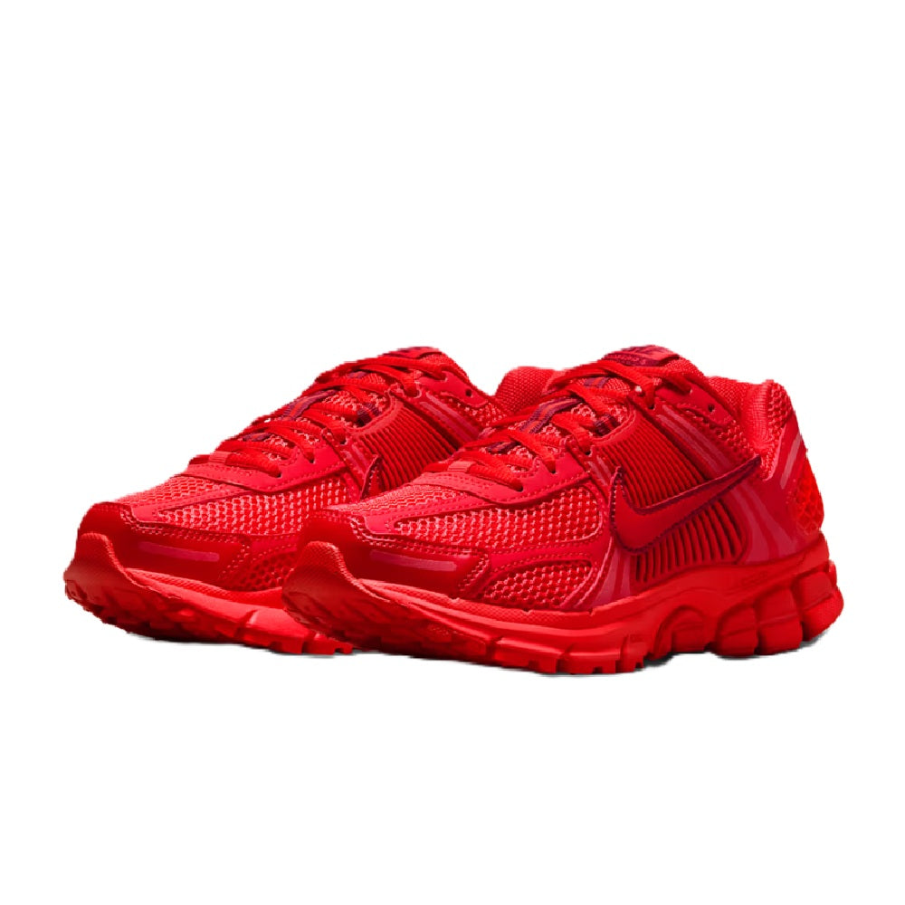 Pair of red Nike Zoom Vomero 5 LT women's running shoes, lace-up mesh with swoosh
