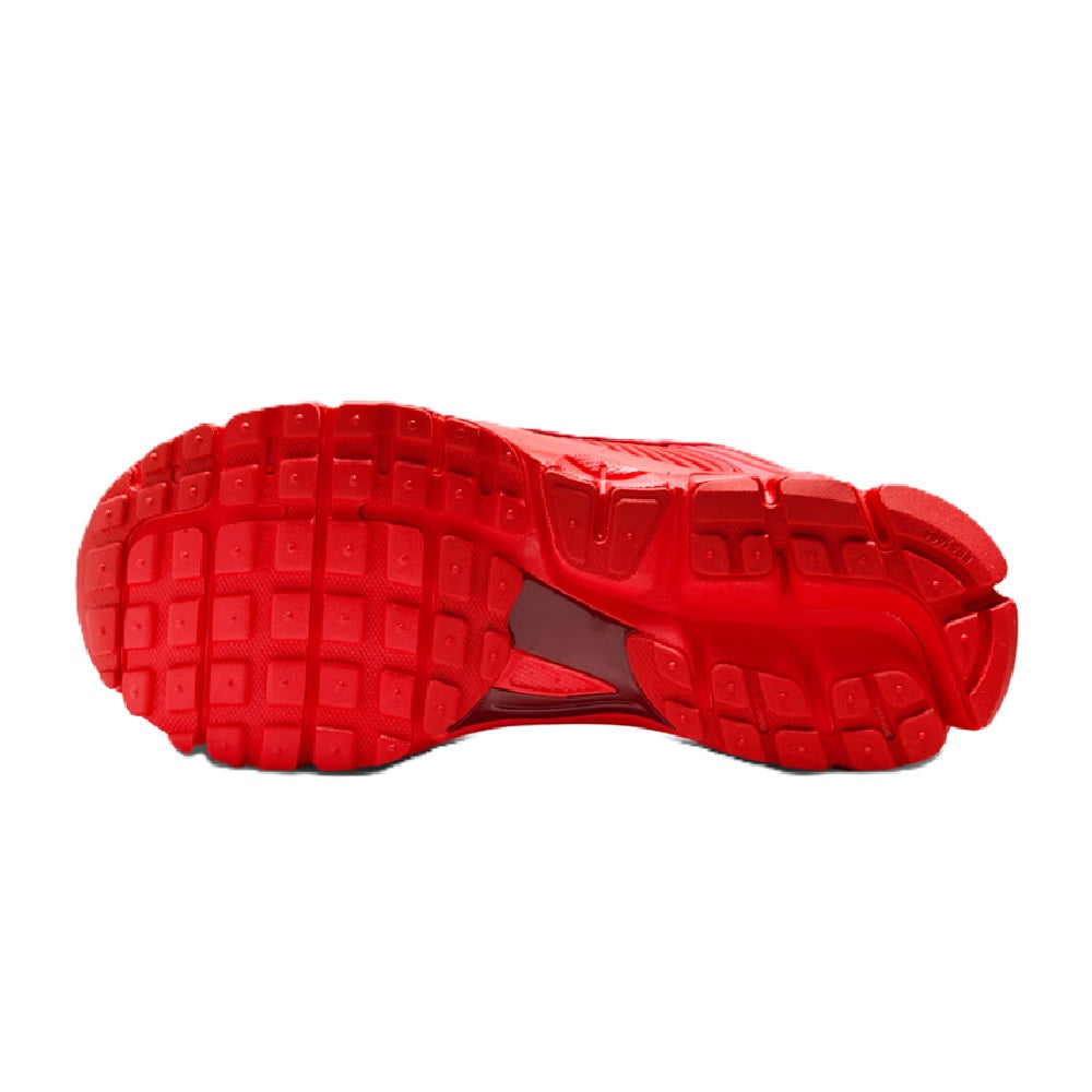 Red Nike Zoom Vomero 5 LT women's shoe outsole, grid tread and flex grooves