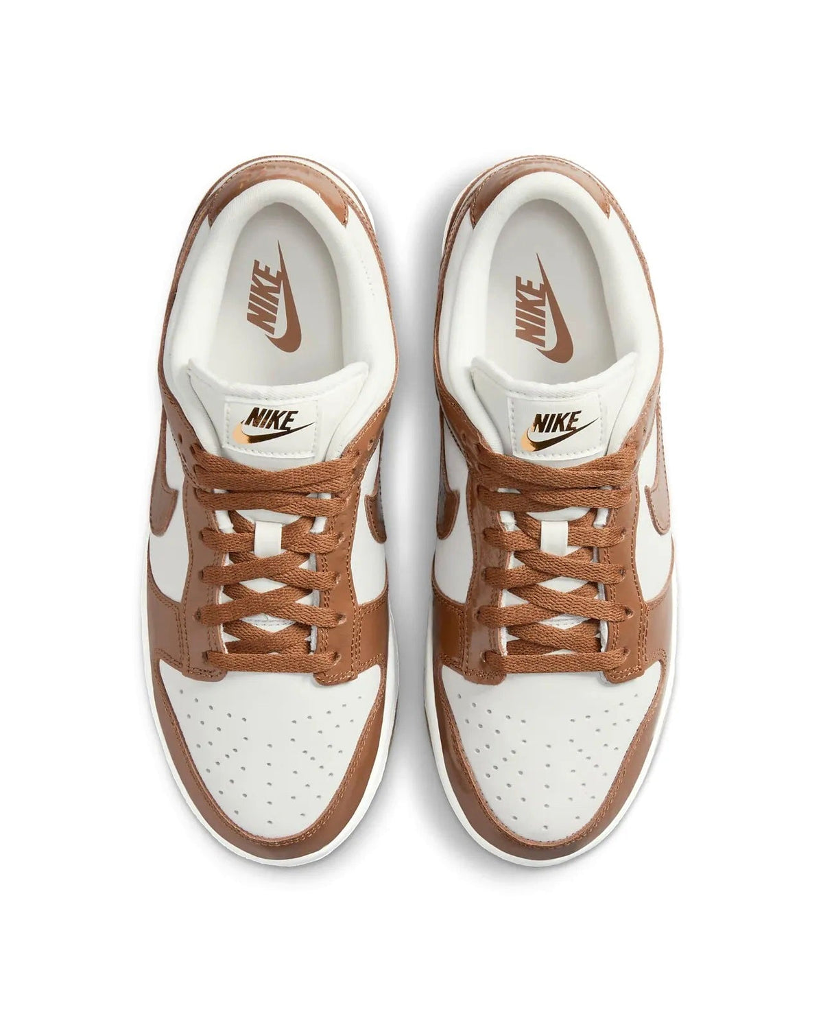 Women's Nike Dunk Low LX sneakers, top view with brown laces and Nike branding