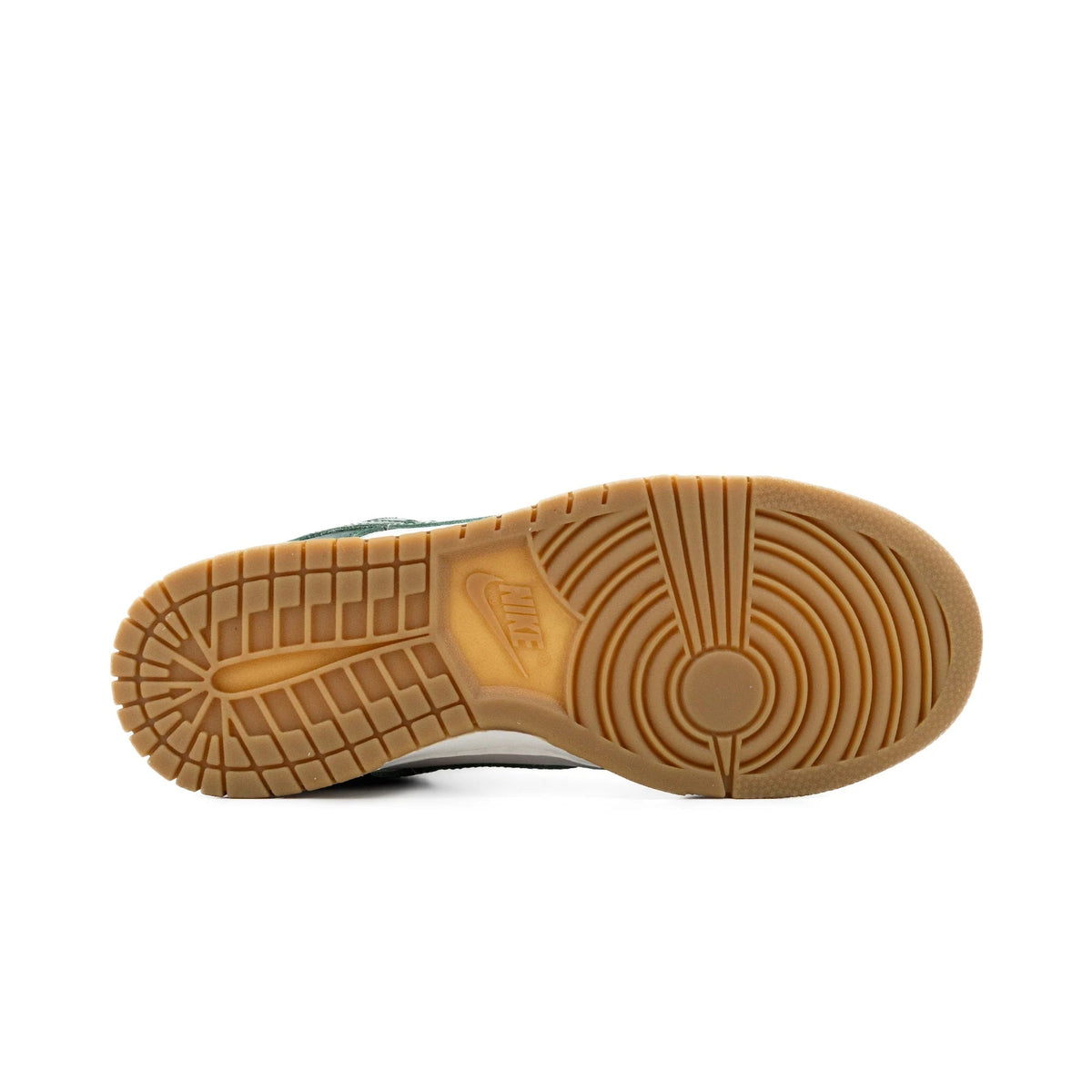 Women's low-top sneaker outsole, tan gum rubber tread with circular traction pattern.