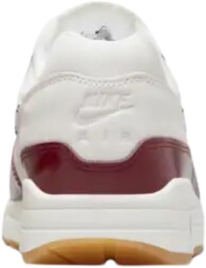 Nike Air Max 1 LX sneakers, heel view with sail upper and team red trim and air sole