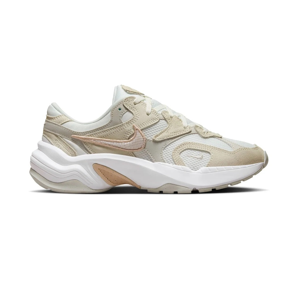 Nike women's running sneakers, light bone with tan accents, white chunky sole