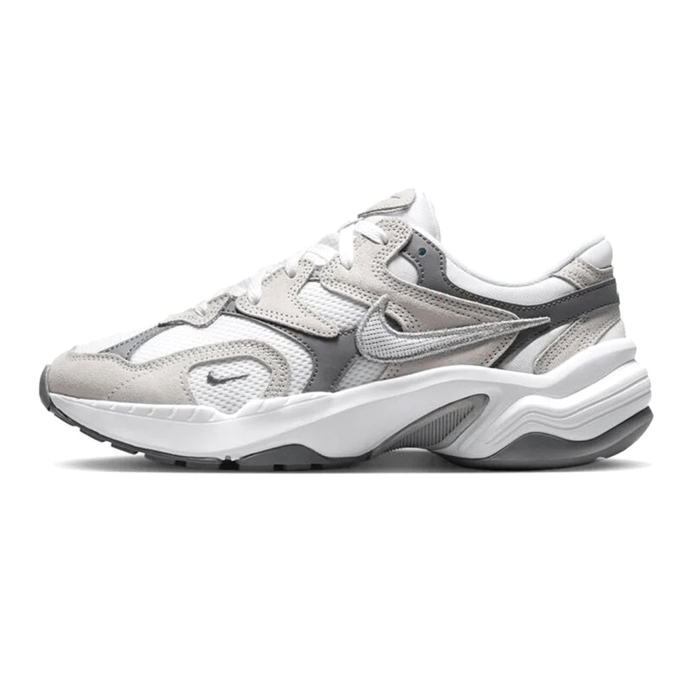 Women's Nike AL8 sneakers in white with metallic silver accents, lace-up side view.