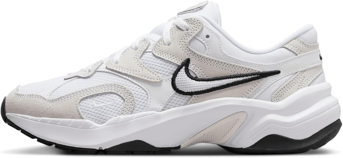 Women's Nike lace-up sneakers in white with black swoosh and chunky sole