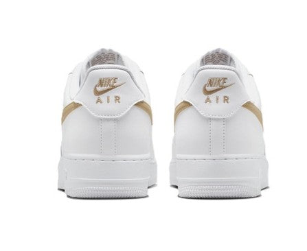 Nike sneakers heel view with white leather, tan lining detail, Nike Air text